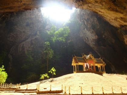 A gold pavilion illuminated by natural sunlight in Thailand